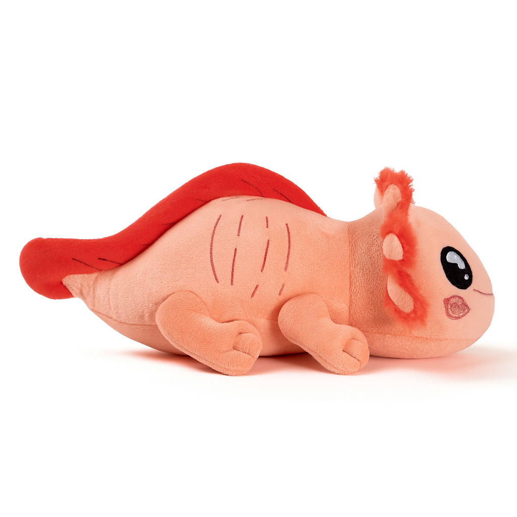 Plush toy resembling a small dinosaur with red accents on a white background