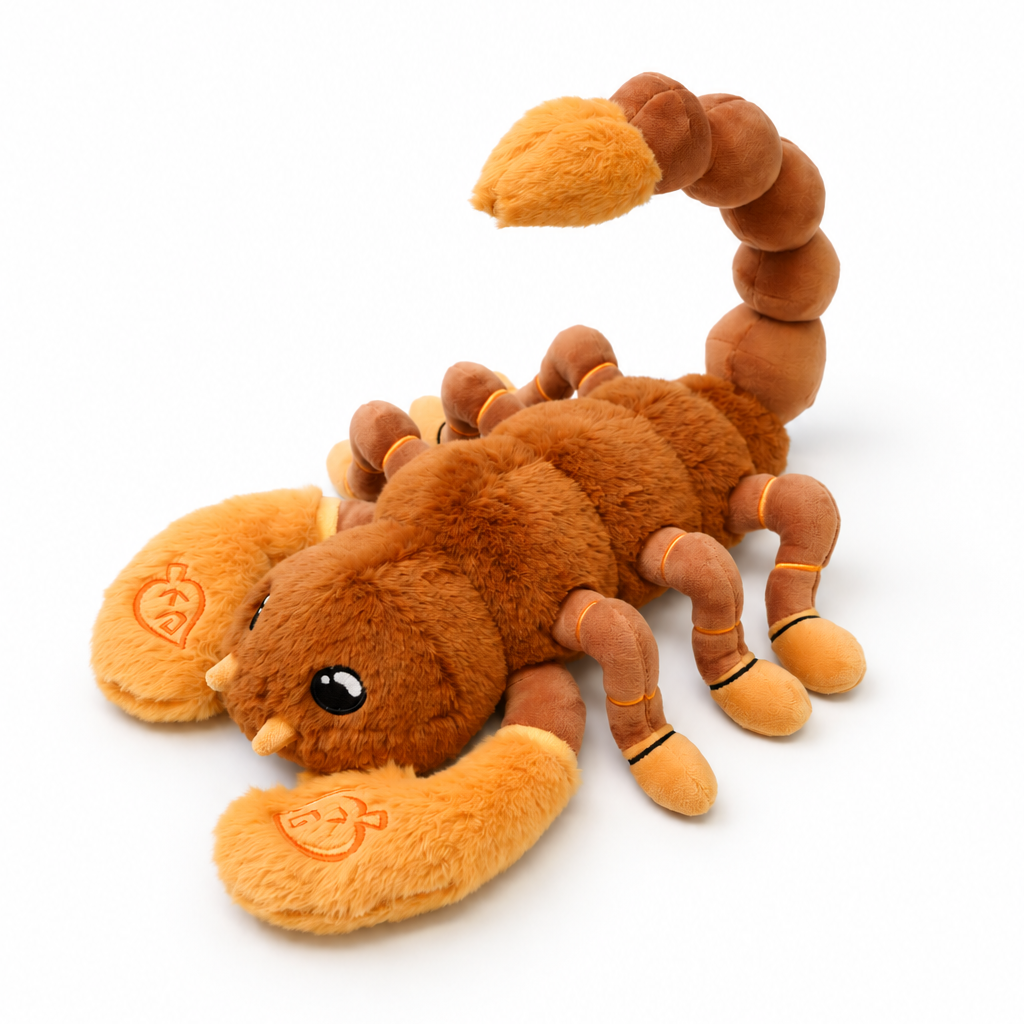 A plush toy scorpion in shades of brown and orange, featuring a black bead eye and embroidered smiley faces on its claws, photographed on a seamless white background.